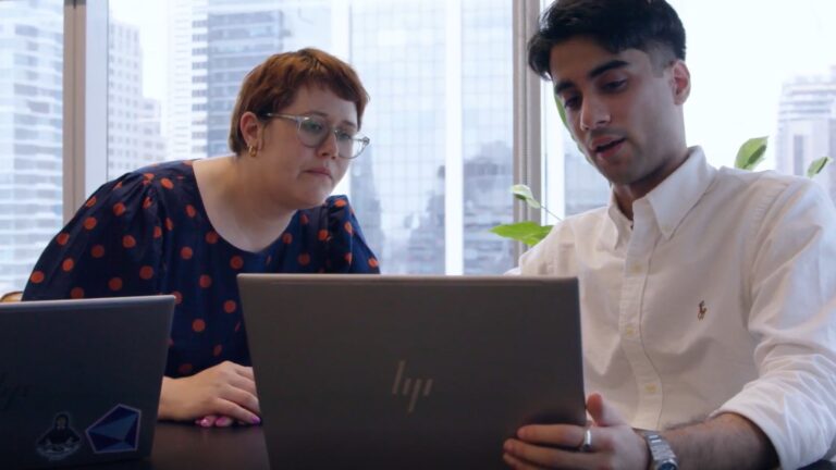 photo of Lindsay and Hasham Working